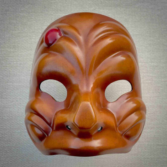 Front view of handmade Arlecchino Commedia dell Arte Mask in brown with sculpted facial features by Strangeface Masks