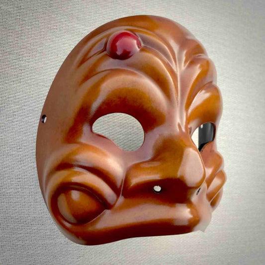 Side view of handmade Arlecchino Commedia dell Arte Mask in brown with sculpted facial features by Strangeface Masks